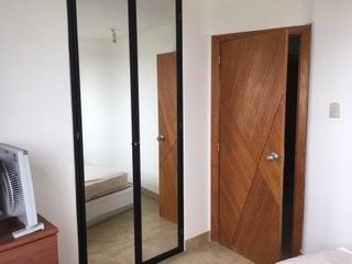   Closet With Full Length Mirrored Doors 