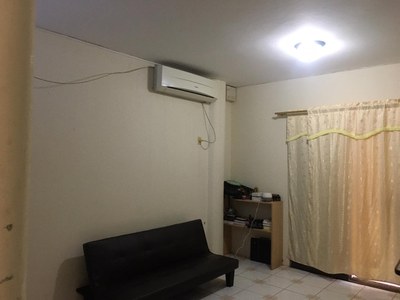 Large Window And Air Conditioner In Living Room