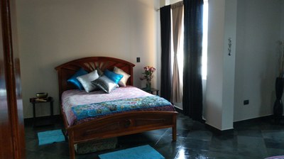 Bedroom has Asian decor