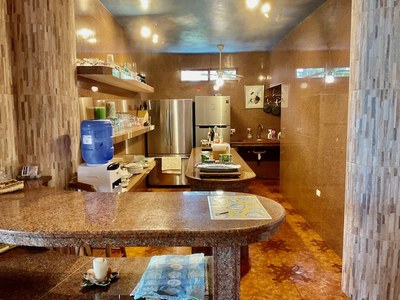 Kitchen Gleams With Tile And Marble
