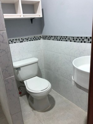 Bathroom On Upper Level Shared By Second And Third Bedrooms