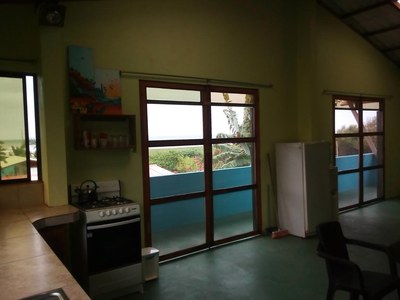 View From Kitchen To Balcony Of Main House Upper Level Apartment