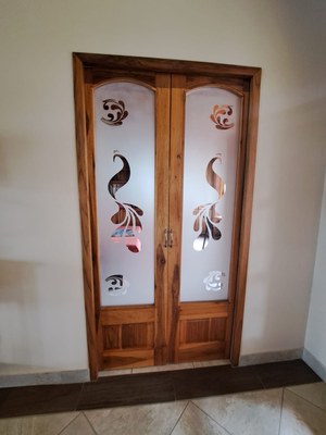 Beautiful wooden door with etched glass