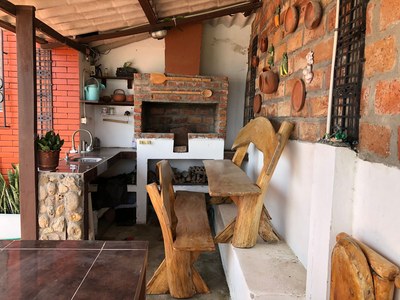 Unique Handcrafted Wooden Furniture In Barbeque Area
