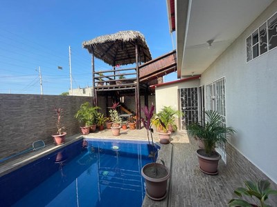 Inground pool, outdoor seating, Palapa