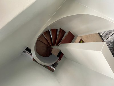 Modern Home Country Setting Spiral Staircase down to Garage