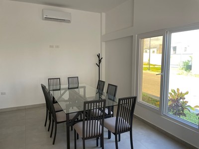 Large separate dining area with picture window and a/c