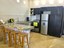 Modern open-concept kitchen ~ Casa Buena Vista Beach House