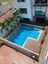 Obviously Only in Olon ~ Totally Turnkey Condo with Pool, Gym, and the Best Beach